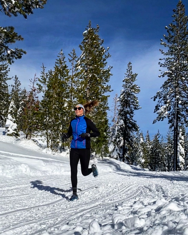 Woman running in snow